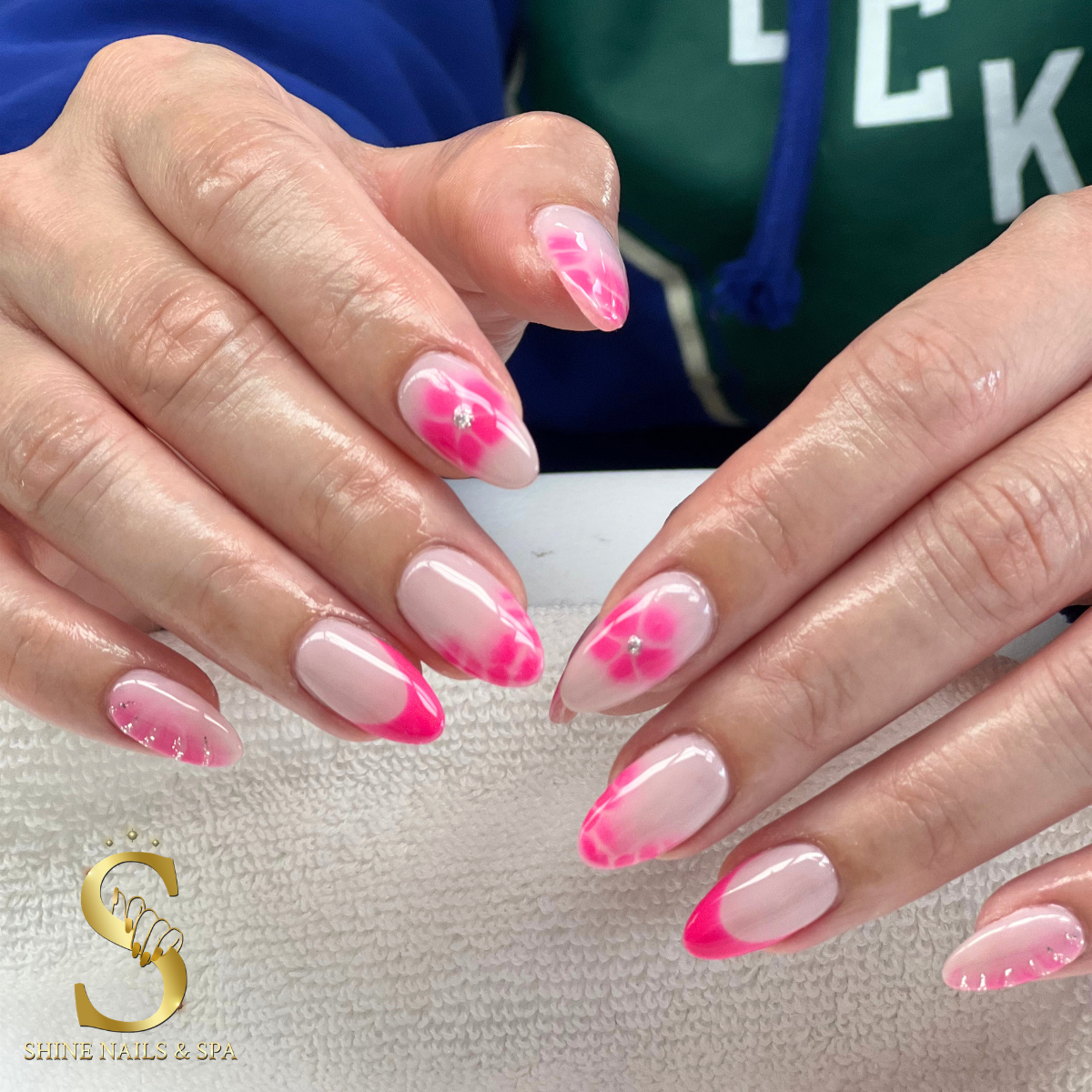 Shine Nails & Spa logo